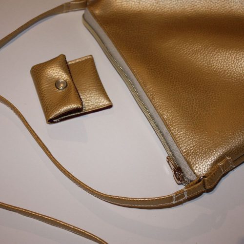 Goldene Handtasche Tampontasche